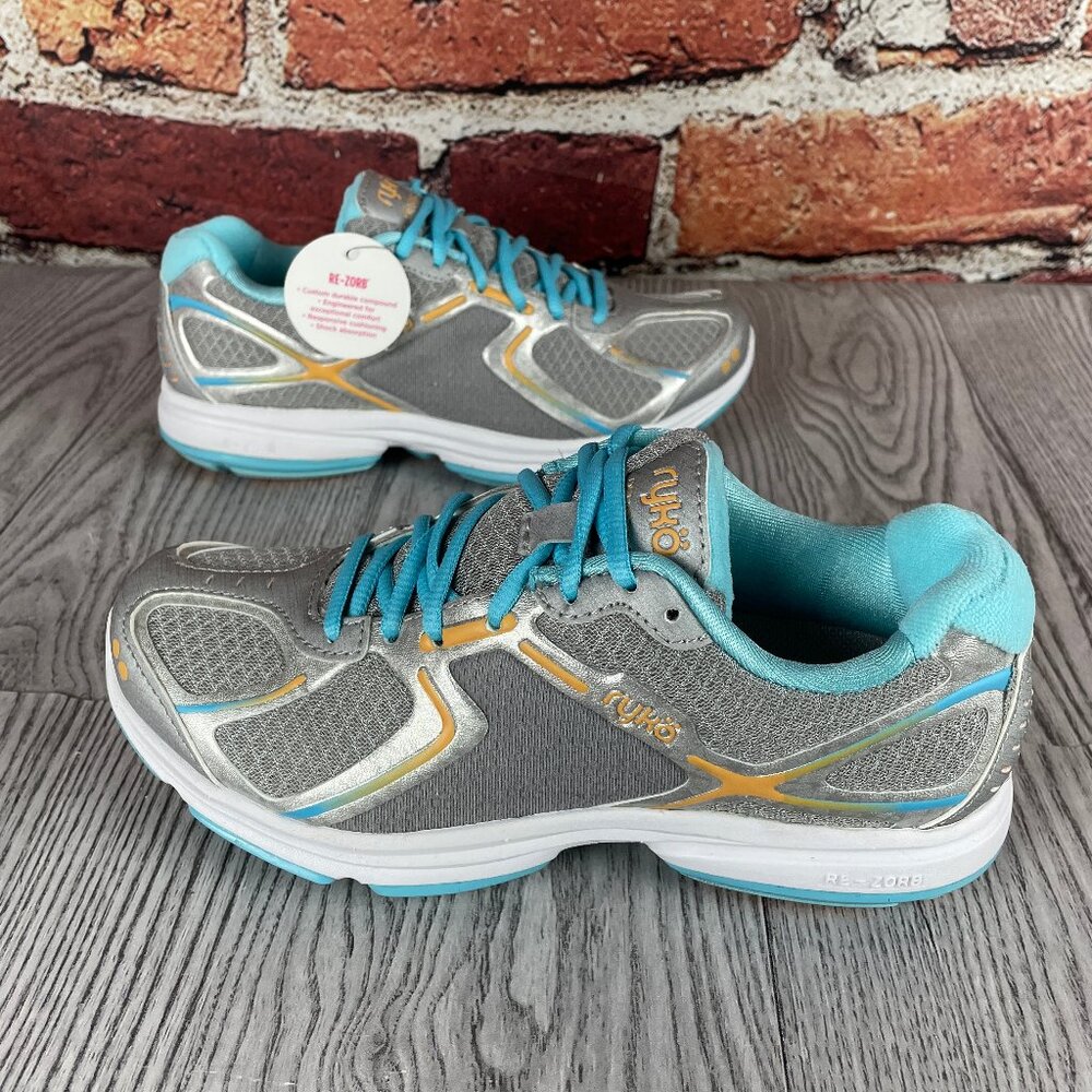 Ryka Women's Devotion, Chrome Silver/Nirvana Blue/Tangerine Orange, 5 M US